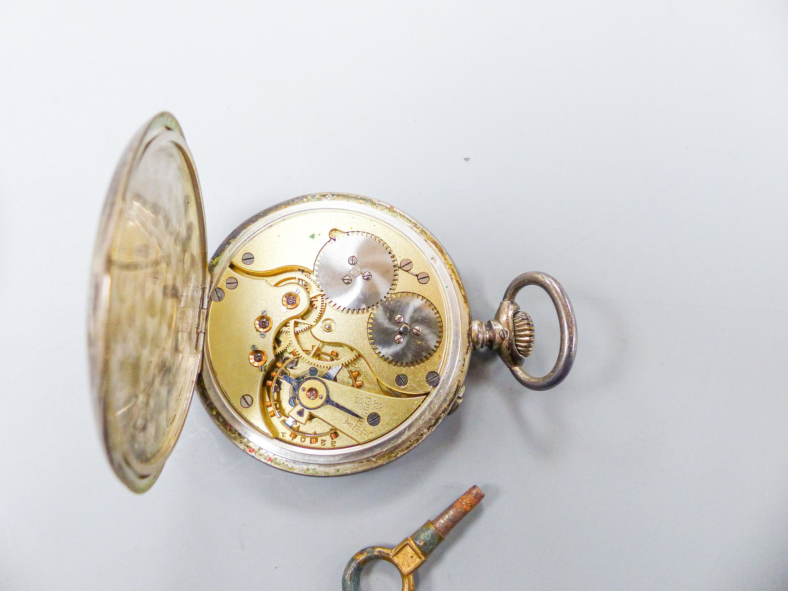 A late 18th century French silver keywind pocket watch by Borguin le Jeune, chain driven and with white enamel dial (lacking glass), case diameter 6cm. and an IWC 800 standard pocket watch.